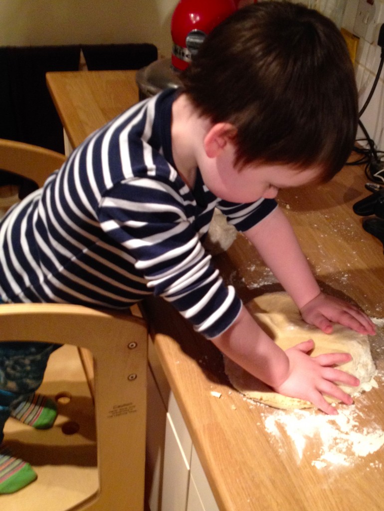 Hard at work rolling the dough!!