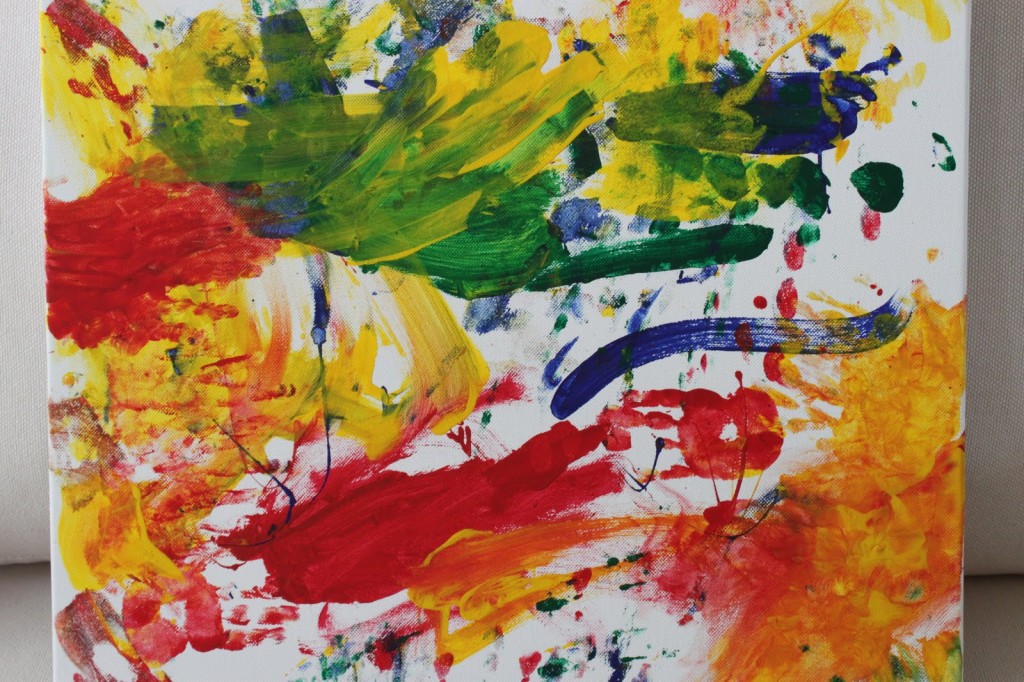 This is the type of art work that can be expected from a very young child, its exploring colour and texture.