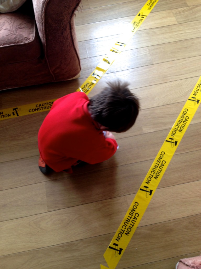Construction tape along the floor went down a treat! Really easy to buy from somewhere like eBay, and not at all pricey!